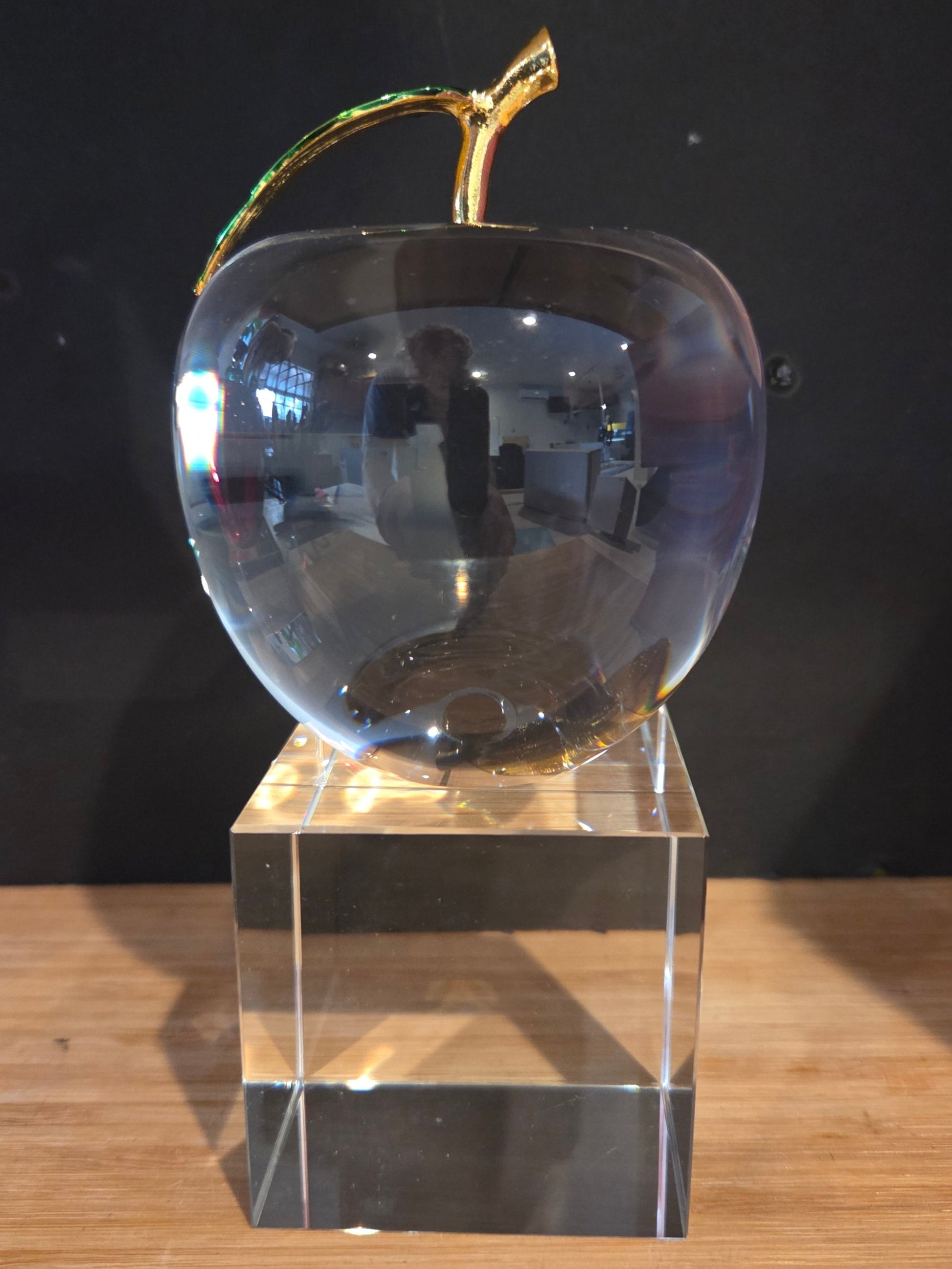 Clear crystal apple with gold stem on a clear base