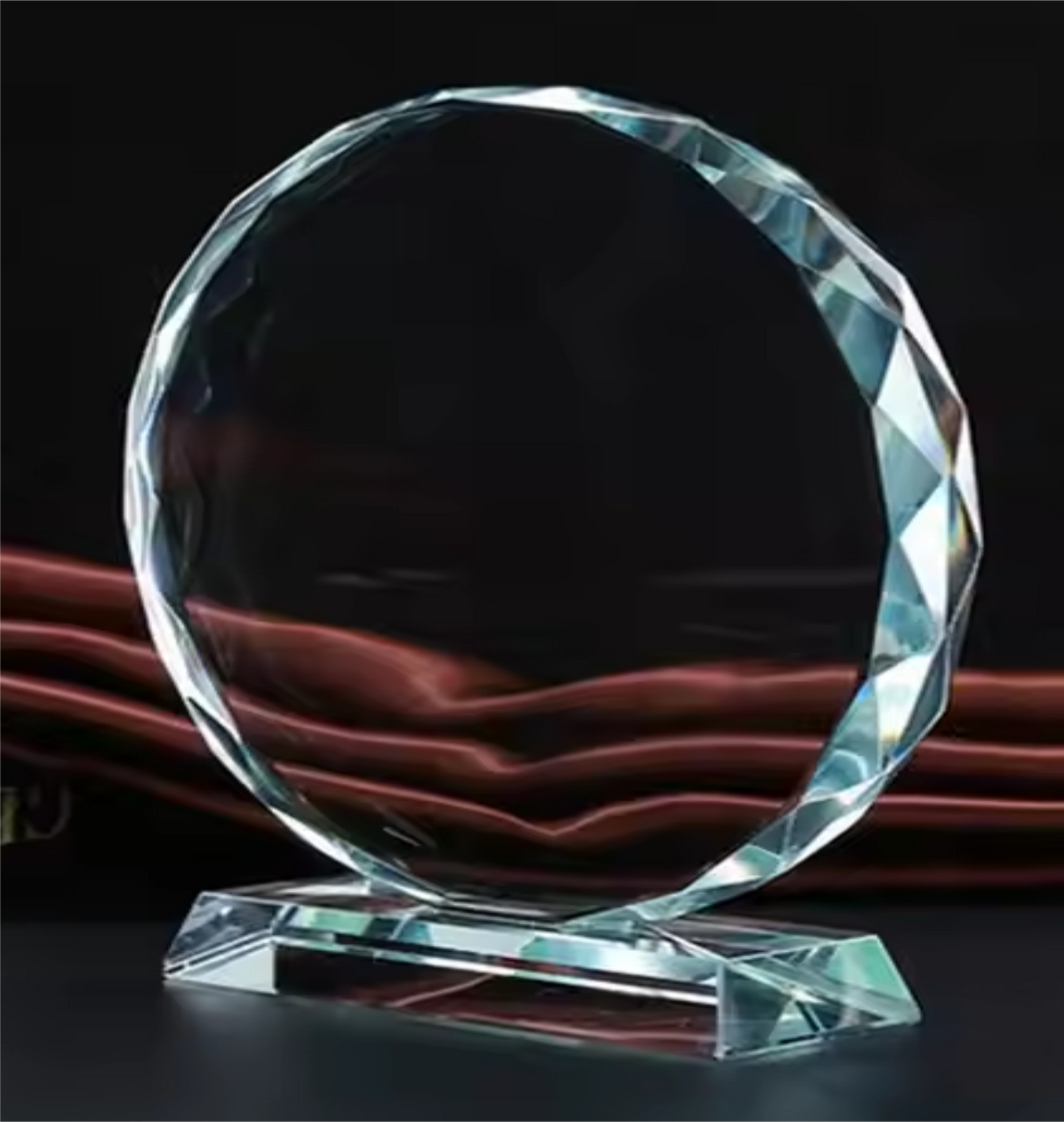 Optic crystal facet round piece attached to clear pedestal base. Packaged individually in a lined gift box. Premier Crystal is the ultimate way to recognize and honor!